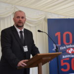 FIA CEO Ian Moore addresses the audience at the House of Commons