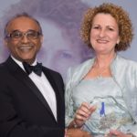 Elizabeth Sheldon receives her Women Leaders Award from Jiten Patel of category sponsor The Open University