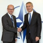 GCHQ's director Jeremy Fleming (left) meets with NATO Secretary General Jens Stoltenberg