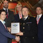 City of London Police Commissioner Ian Dyson presents Aon and Mitie representatives with the 'Secured Environments' accreditation